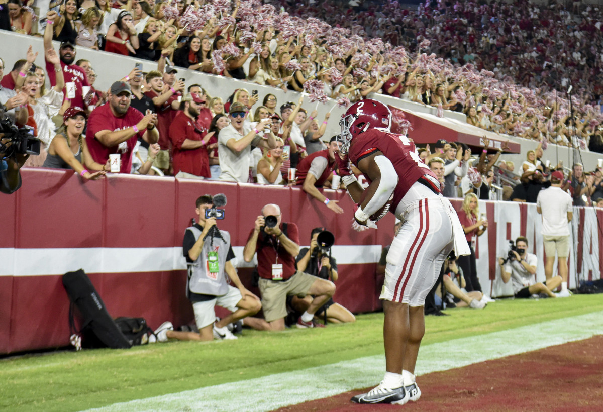 Alabama Crimson Tide running back Jase McClellan (2) celebrates with fans after scoring a touchdown against the Utah State Aggies at Bryant-Denny Stadium. Alabama won 55-0.